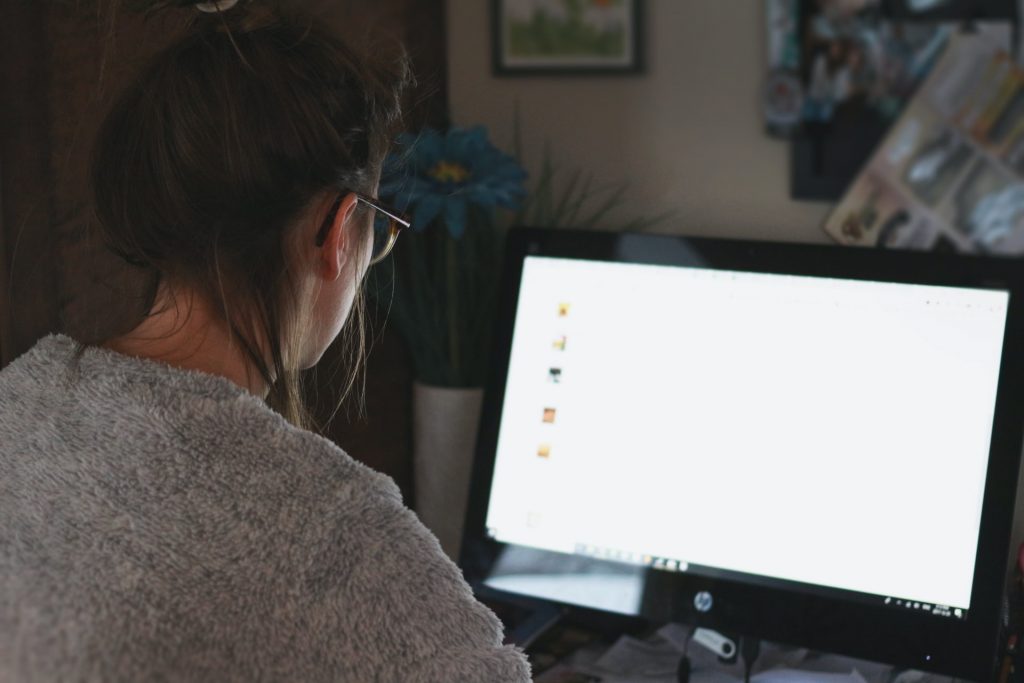 Woman looking at the computer