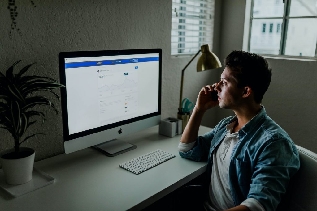 Man looking at desktop